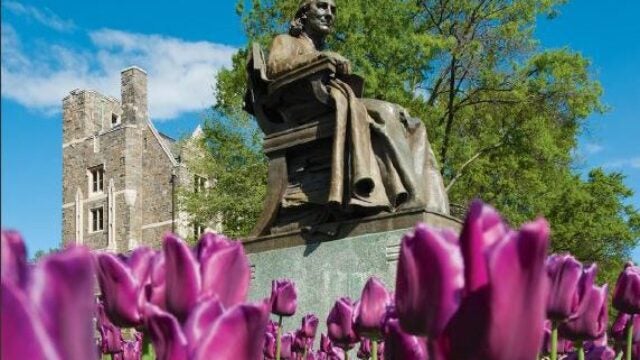 jean carroll statue with flowers